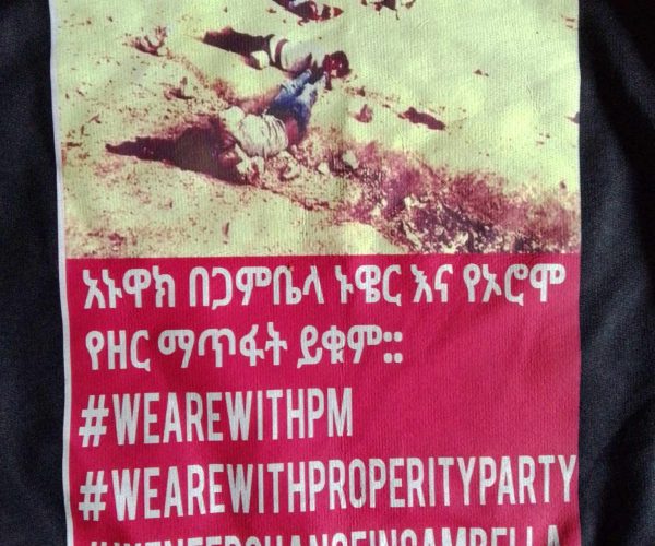 Nuer officials Getting Arrest for wearing T-shirt with the sign that read ‘Stop the Genocide on Nuer and Oromos’.